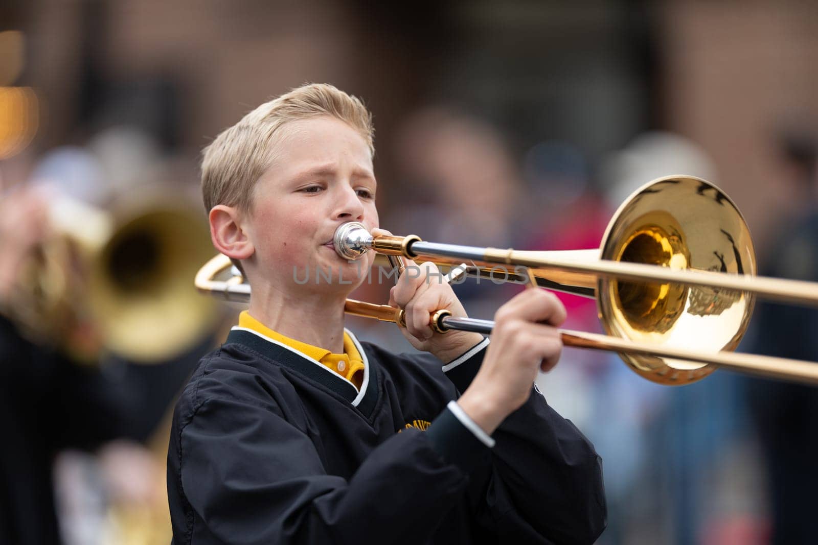 Holland, Michigan, USA - May 11, 2019: Tulip Time Parade, Members of the Hamilton Middle School marching band, performing during the parade