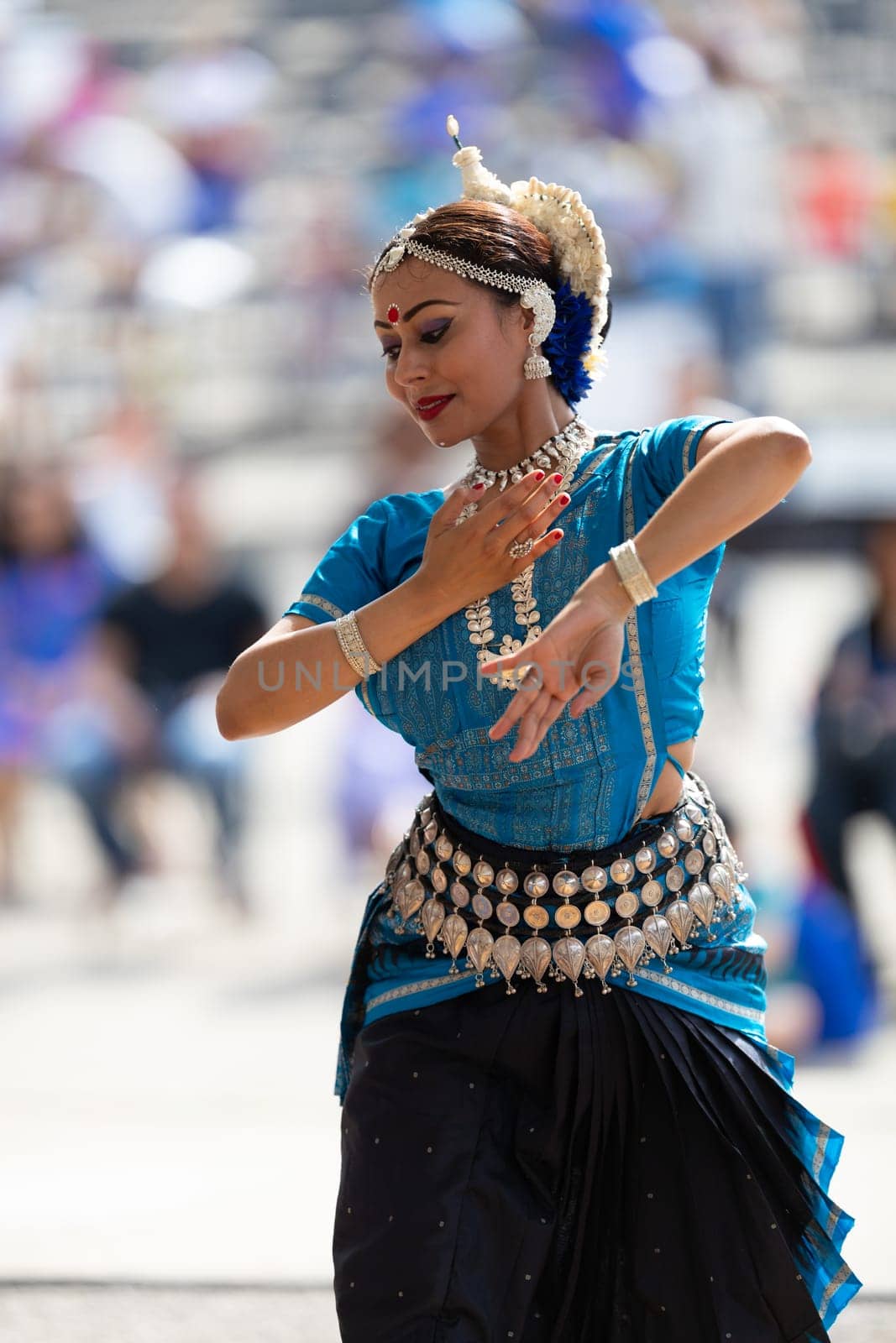Columbus, Ohio, USA - May 26, 2019: Columbus Asian Festival, Franklin Park, Indian women in traditional clothing, performing traditional Indian dance.
