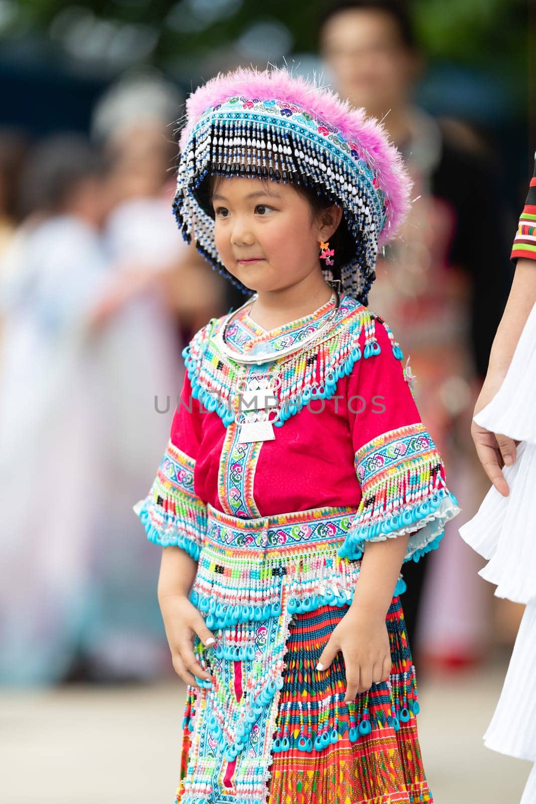 Grand Rapids, Michigan, USA - June 15, 2019: Asian Pacific Festival, hmong people wearing traditional clothing at a fashion display  in the Rosa Parks Circle