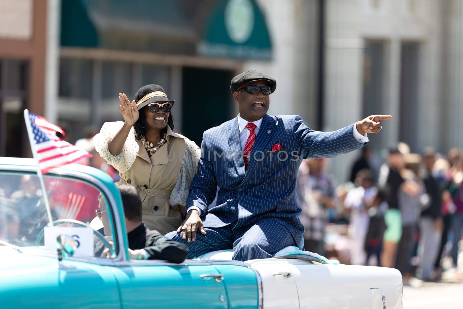 Benton Harbor, Michigan, USA - May 4, 2019: Blossomtime Festival Grand Floral Parade, Classic Car transporting Benton Harbor Mayor Marchus Muhammad