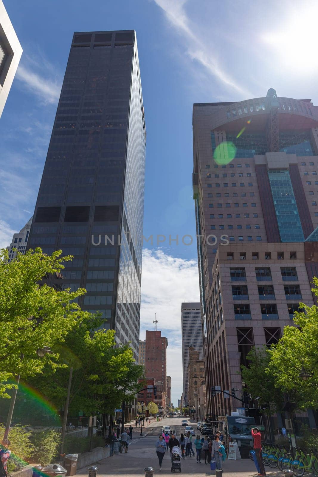 Louisville, Kentucky, USA - April 13, 2019: The Skyline of downtown louisville, looking down South 5th Street, with people walking on the street