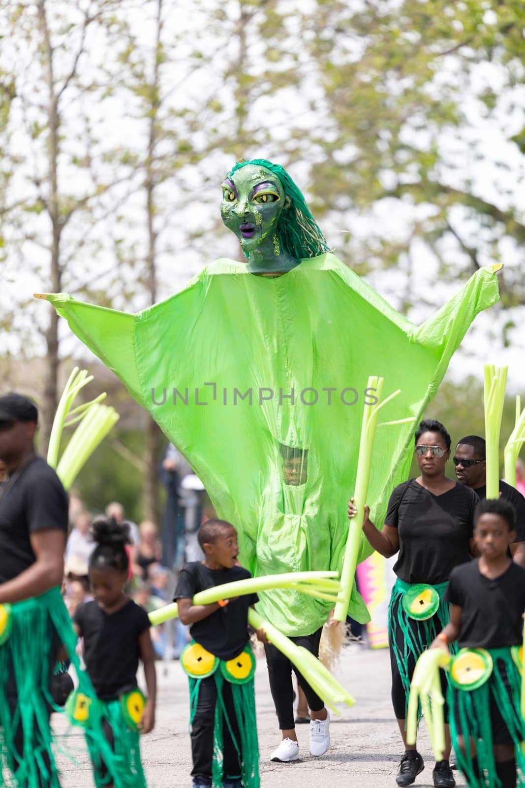 Cleveland, Ohio, USA - June 8, 2019: Parade the Circle, people wearing colorful abstract outfits during the parade