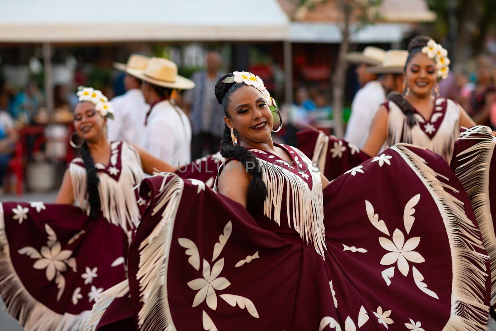 Matamoros, Tamaulipas, Mexico - June 30, 2019:  Kermes Cathedral Nuestra Senora del Refugio, Men and women in traditional clothing, performing traditional dances during a Church Festival in the streets of Matamoros