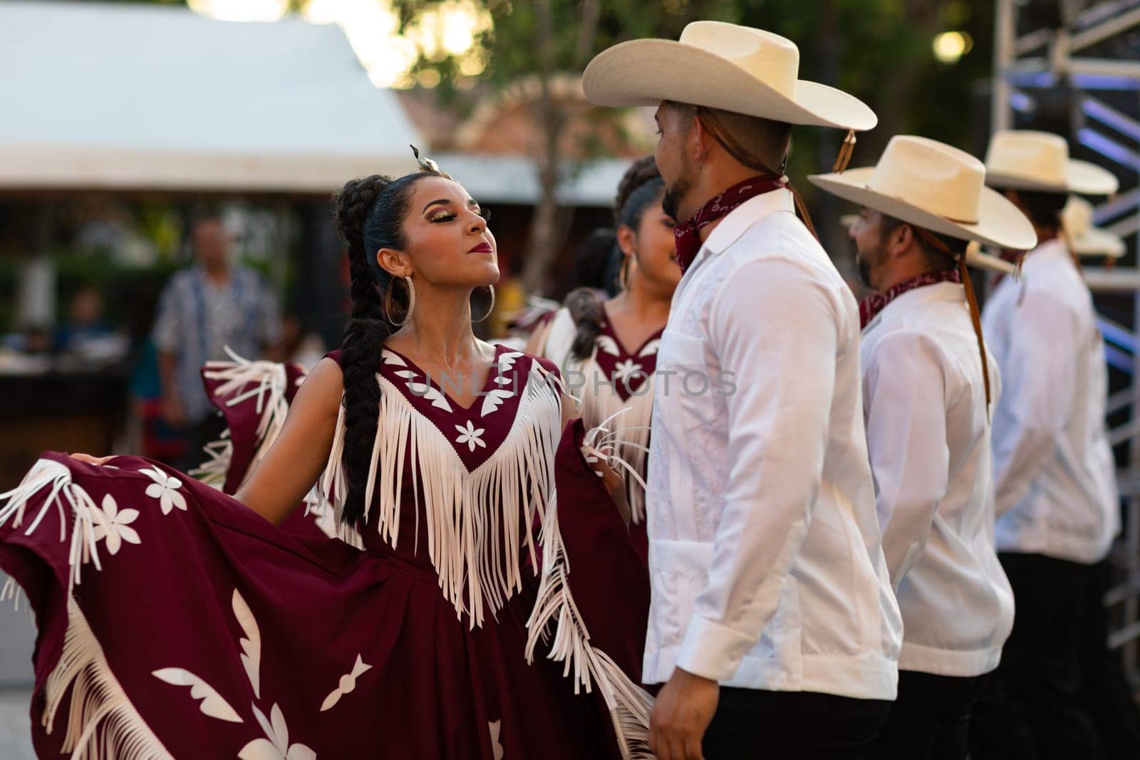 Matamoros, Tamaulipas, Mexico - June 30, 2019:  Kermes Cathedral Nuestra Senora del Refugio, Men and women in traditional clothing, performing traditional dances during a Church Festival in the streets of Matamoros