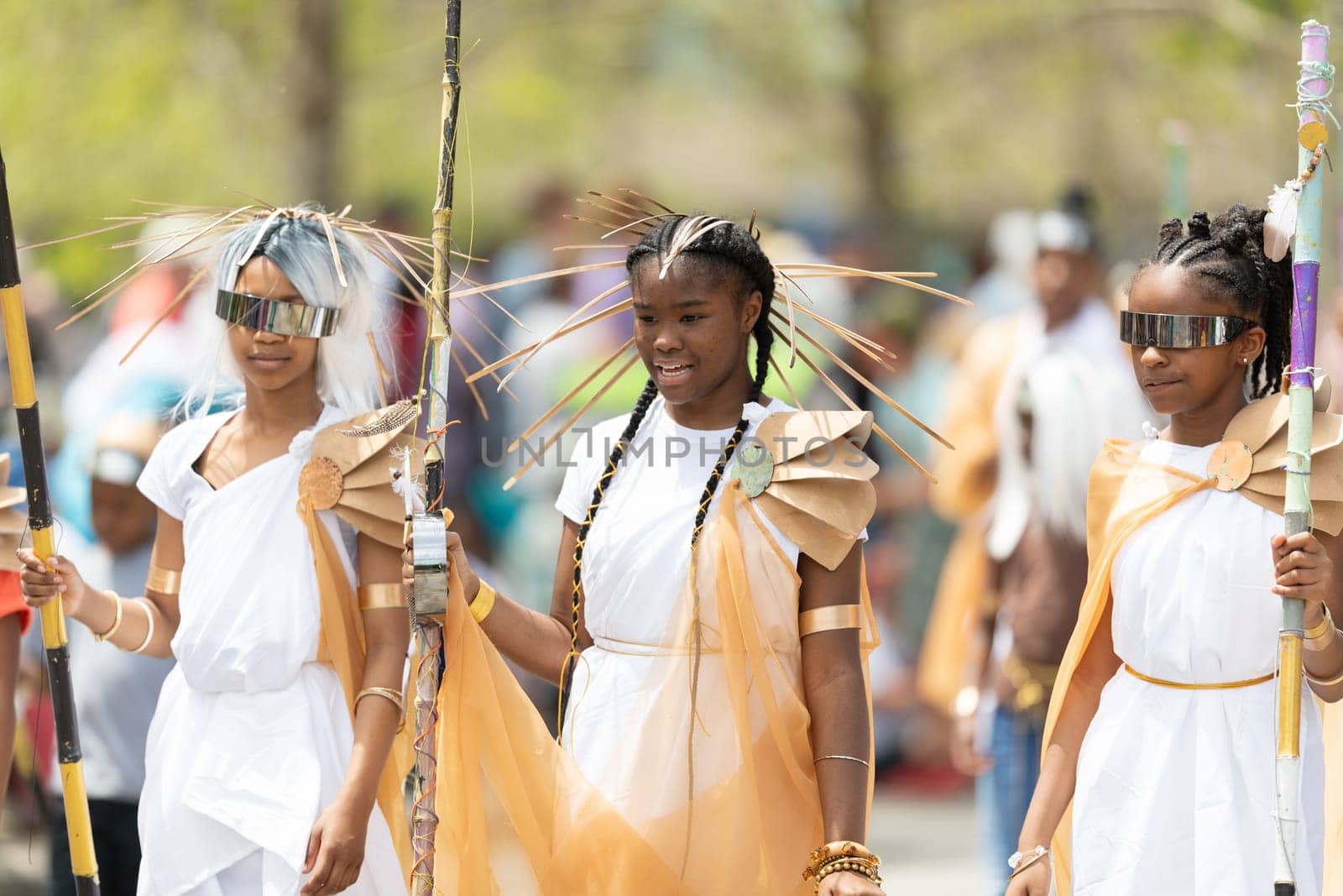 Cleveland, Ohio, USA - June 8, 2019: Parade the Circle, people wearing colorful abstract outfits during the parade
