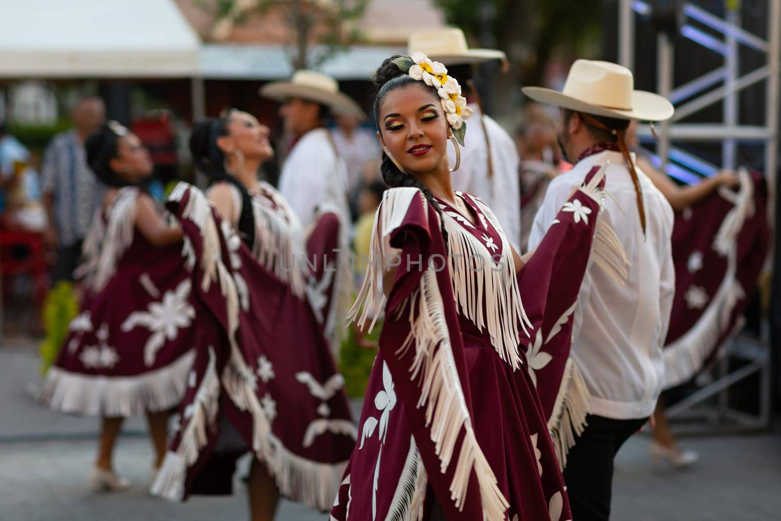 Matamoros, Tamaulipas, Mexico - June 30, 2019:  Kermes Cathedral Nuestra Senora del Refugio, Men and women in traditional clothing, performing traditional dances during a Church Festival in the streets of Matamoros