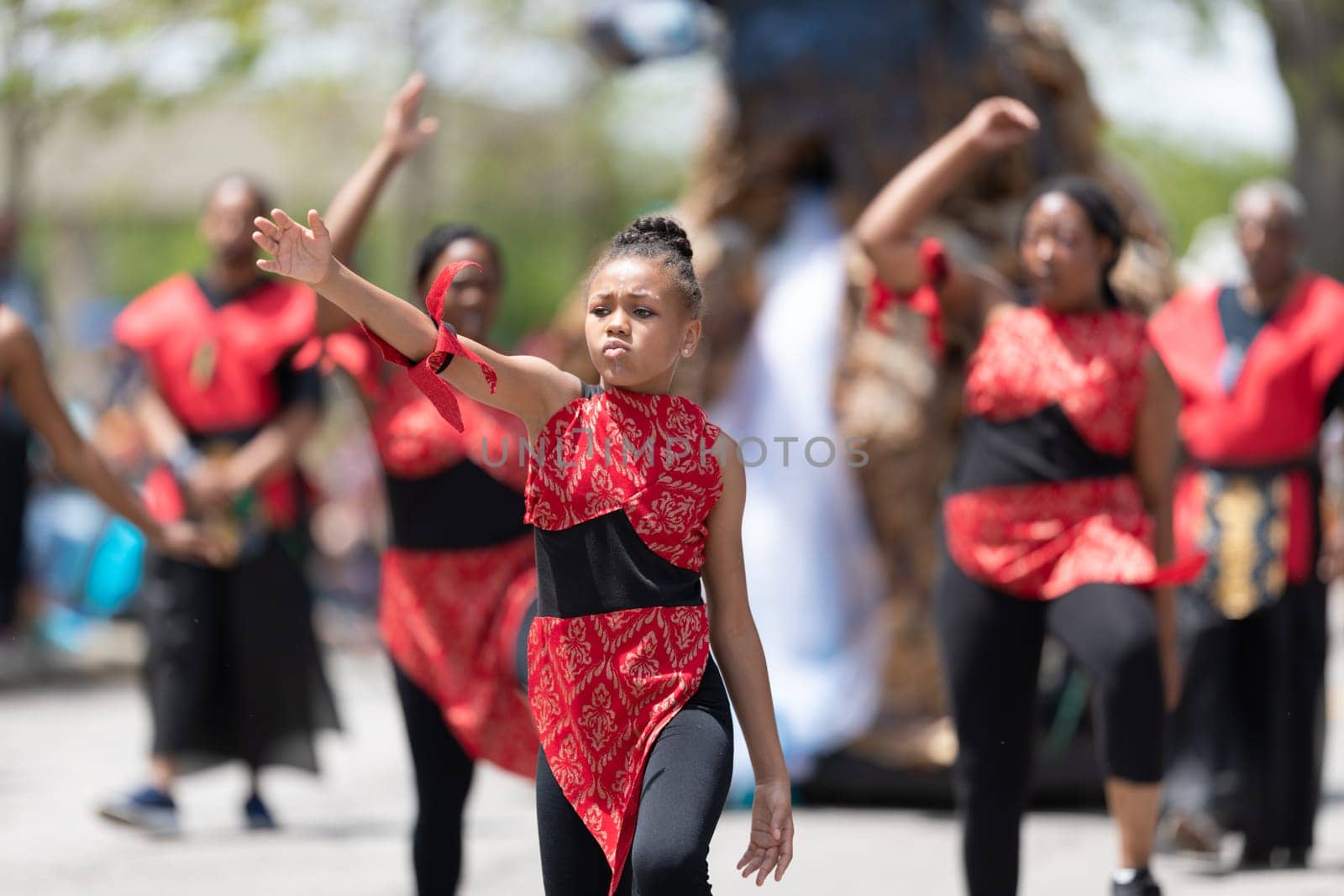Cleveland, Ohio, USA - June 8, 2019: Parade the Circle, african american women and children wearing african style clothing dancing