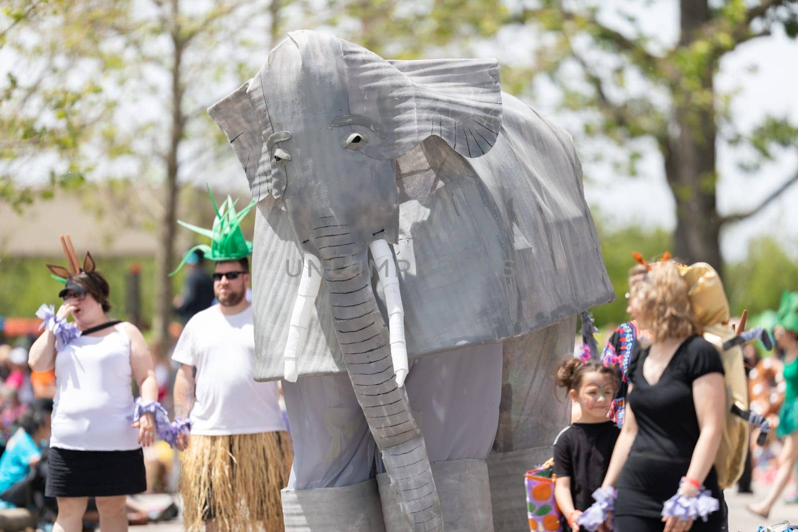Cleveland, Ohio, USA - June 8, 2019: Parade the Circle, people carry a large abstract elephant