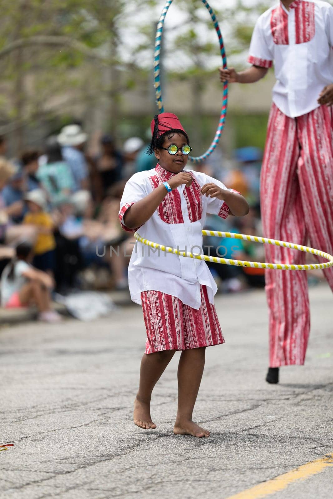 Cleveland, Ohio, USA - June 8, 2019: Parade the Circle, person playing with a hula hoop