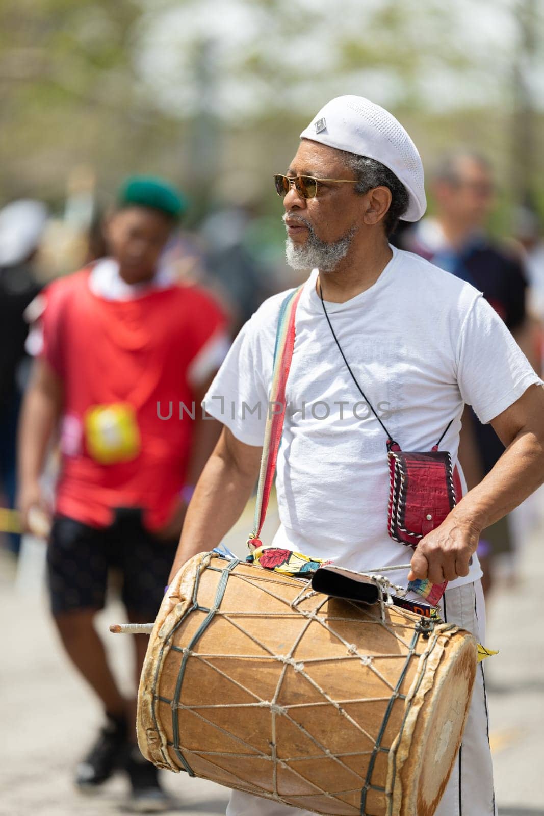Cleveland, Ohio, USA - June 8, 2019: Parade the Circle, African American man playing the drums during the parade