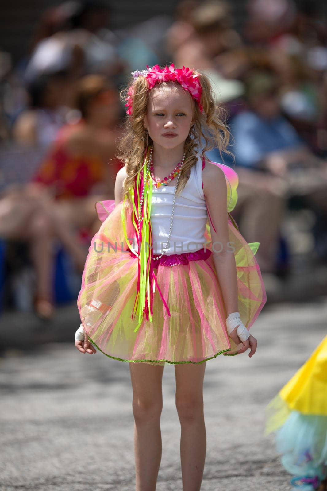 Cleveland, Ohio, USA - June 8, 2019: Parade the Circle, young girl wearing a colorful outfit dancing