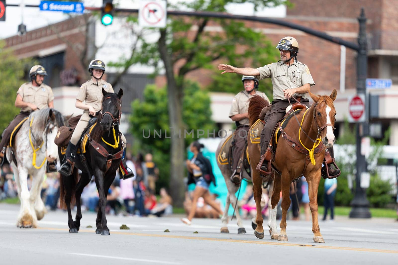 Louisville, Kentucky, USA - May 2, 2019: The Pegasus Parade, Mounted Sheriff riding horses during the parade