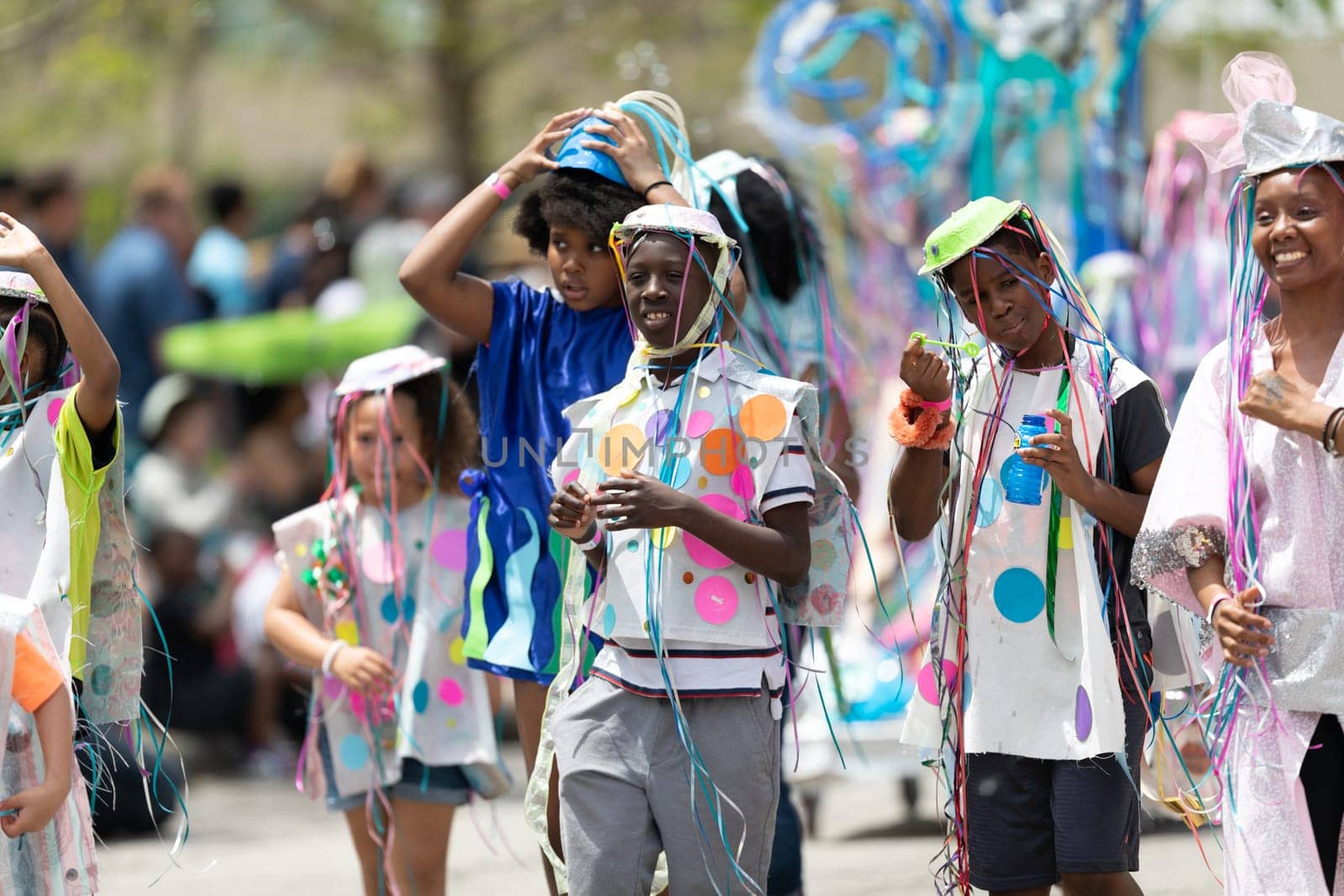 Cleveland, Ohio, USA - June 8, 2019: Parade the Circle, african american boy wearing a hat with ribbons during the parade