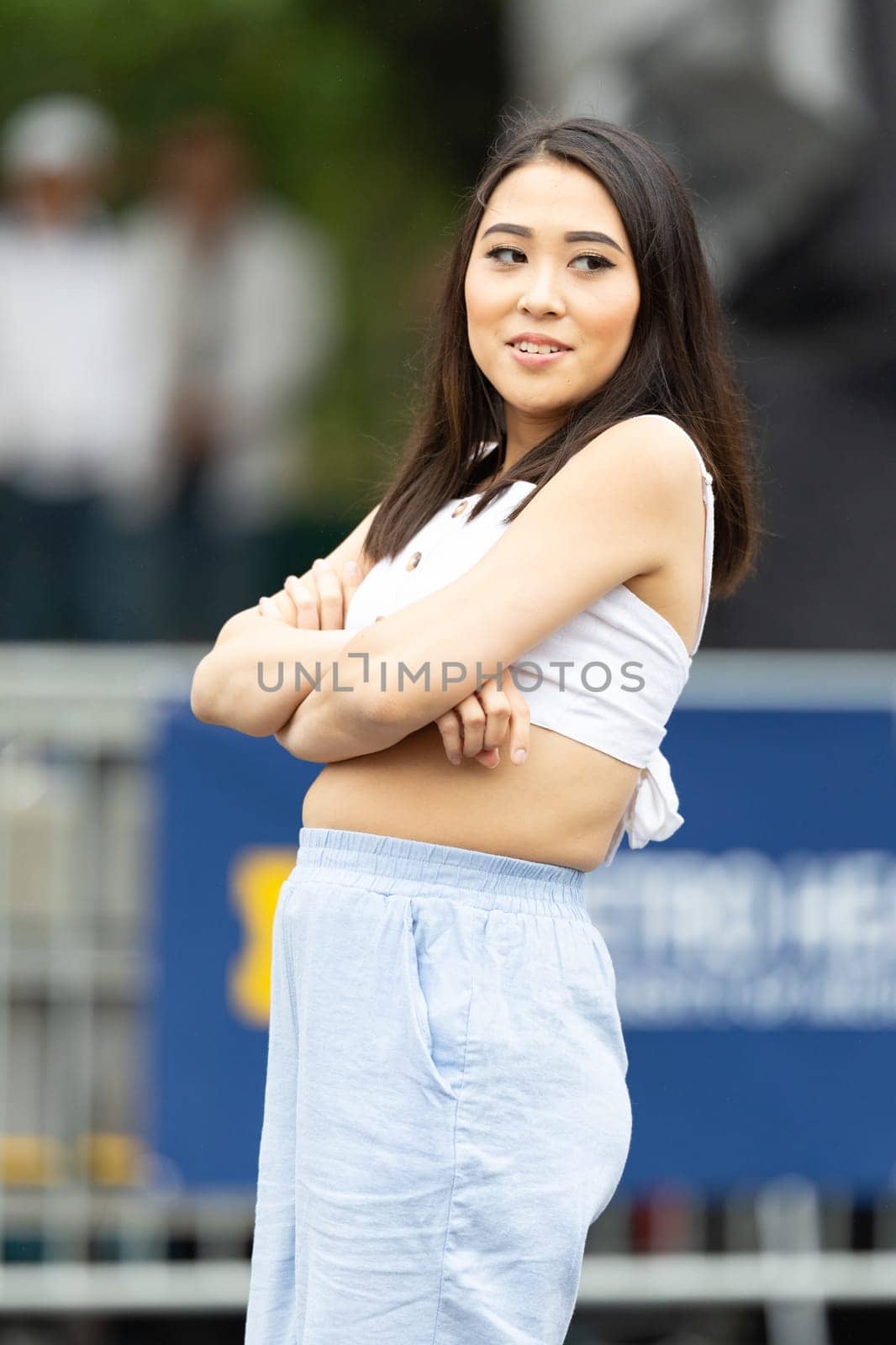 Grand Rapids, Michigan, USA - June 15, 2019: Young Men and Women, performing modern K-POP dance during the asian festival at Rosa Park