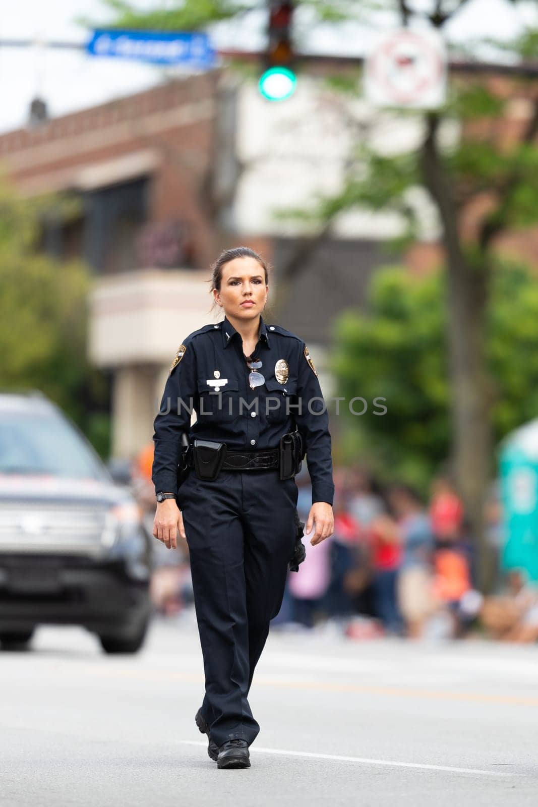 Louisville, Kentucky, USA - May 2, 2019: The Pegasus Parade, Member of the Department of Corrections Metro Keeping order during the parade