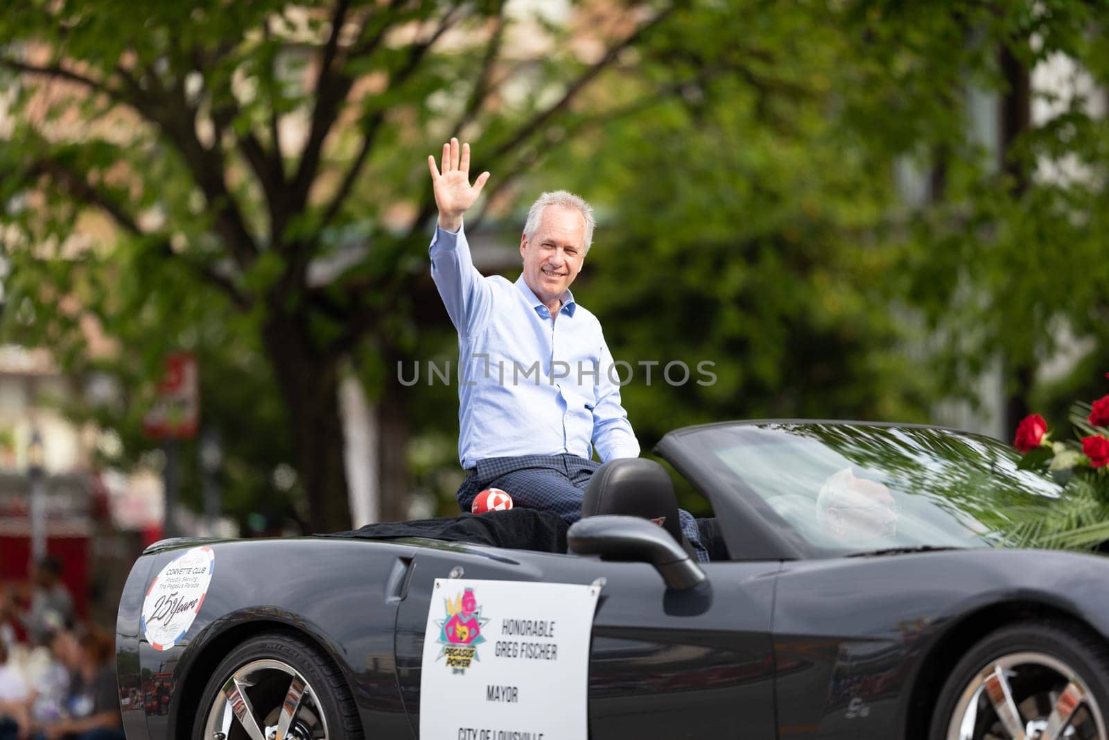 Louisville, Kentucky, USA - May 2, 2019: The Pegasus Parade, Car carrying Mayor of the city of Louisville