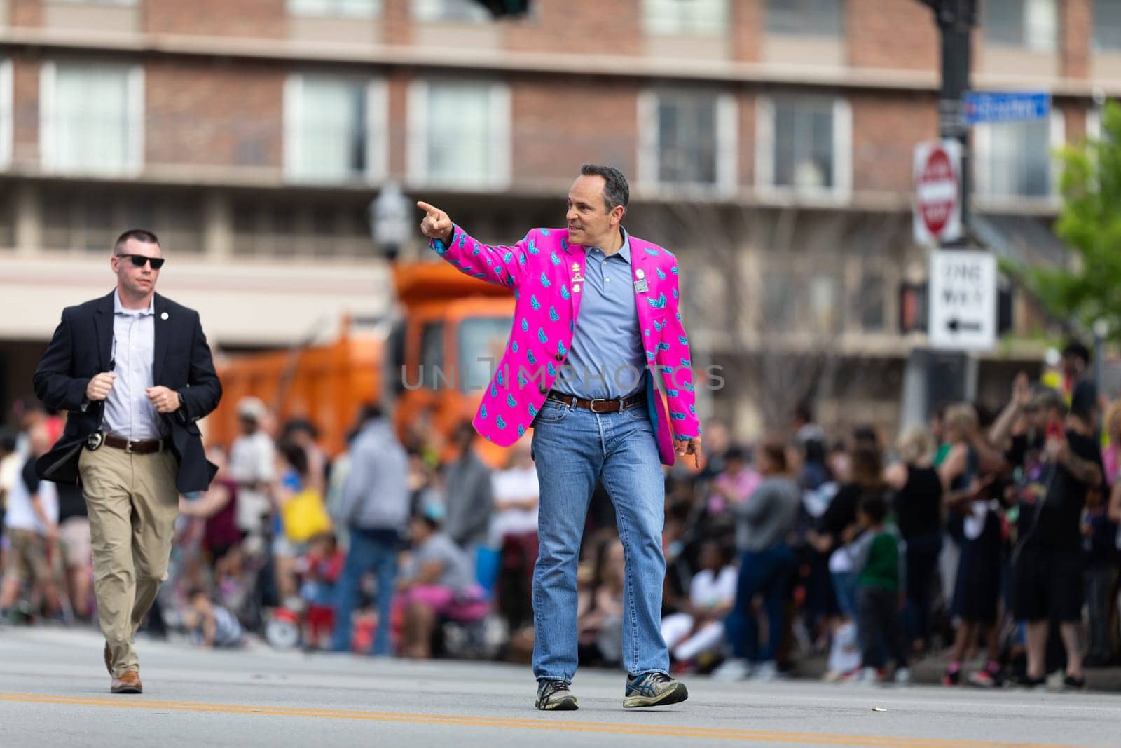 Louisville, Kentucky, USA - May 2, 2019: The Pegasus Parade, Governor of the State of Kentucky, United States, waklking down the street during the parade