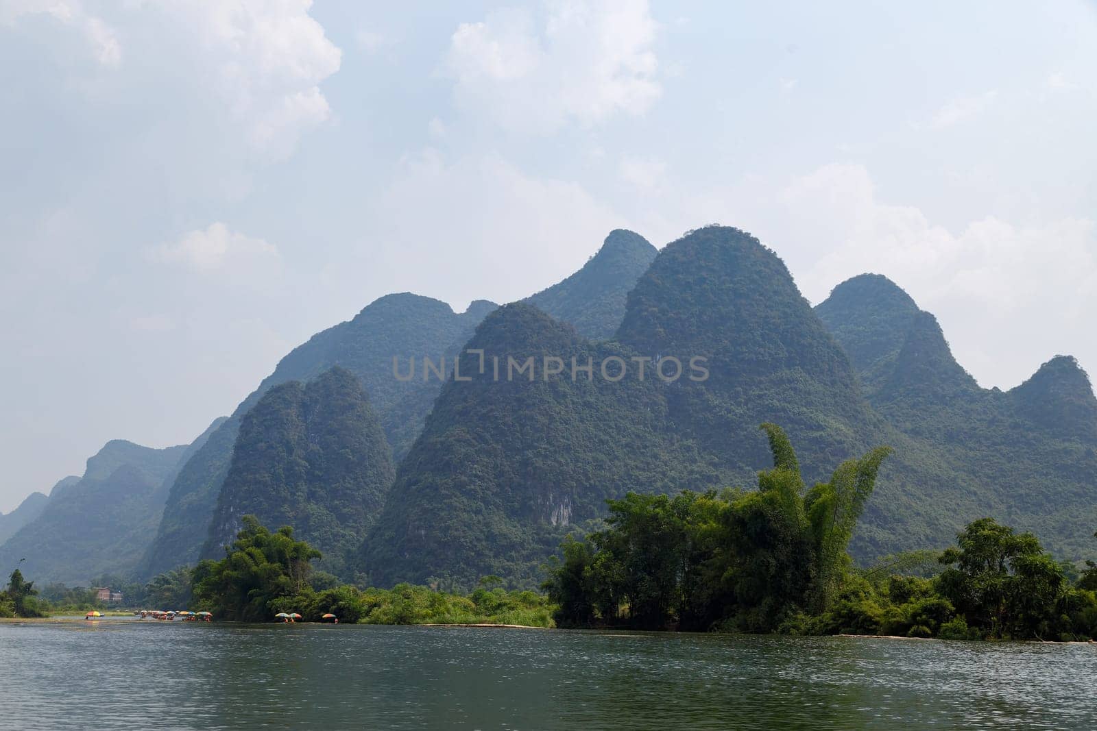View of the picturesque mountains from the river, Yangshuo, China, Asia, River rafting
