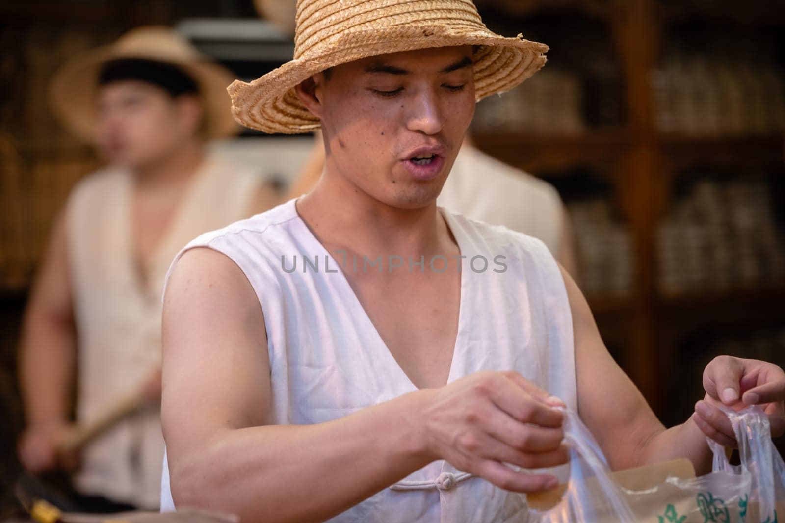 Xian, China -  July 2019 : Traditional local food vendor selling snacks on the street in the Muslim Quarter
