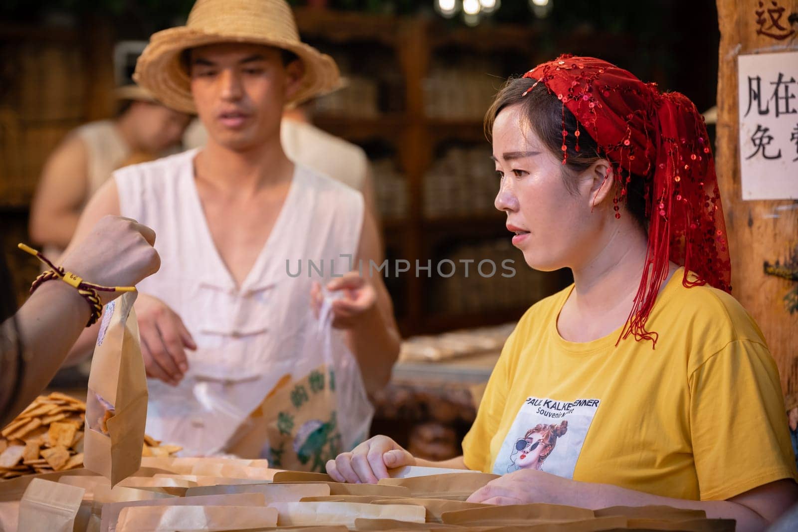 Xian, China -  July 2019 : Traditional local food vendor selling snacks on the street in the Muslim Quarter