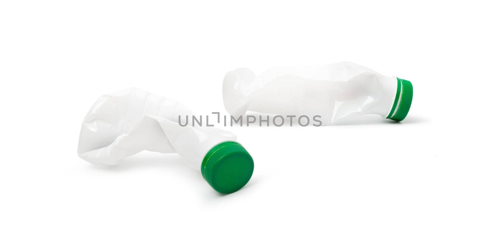 Simple deformed plastic bottles isolated on a white background.