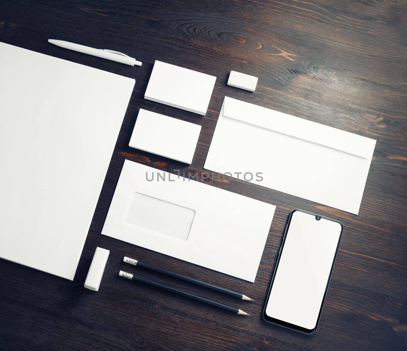 Blank corporate stationery set on wood table background. Branding mock up. Template for placing your design.