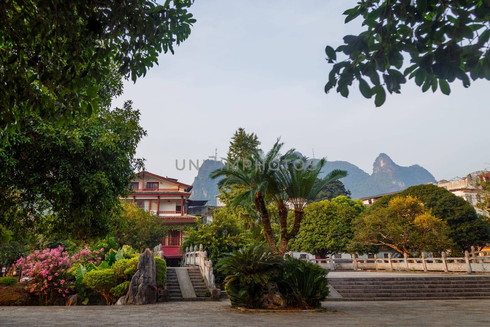 View of a beautiful old park with tropical plants, Yangshuo, China, Asia