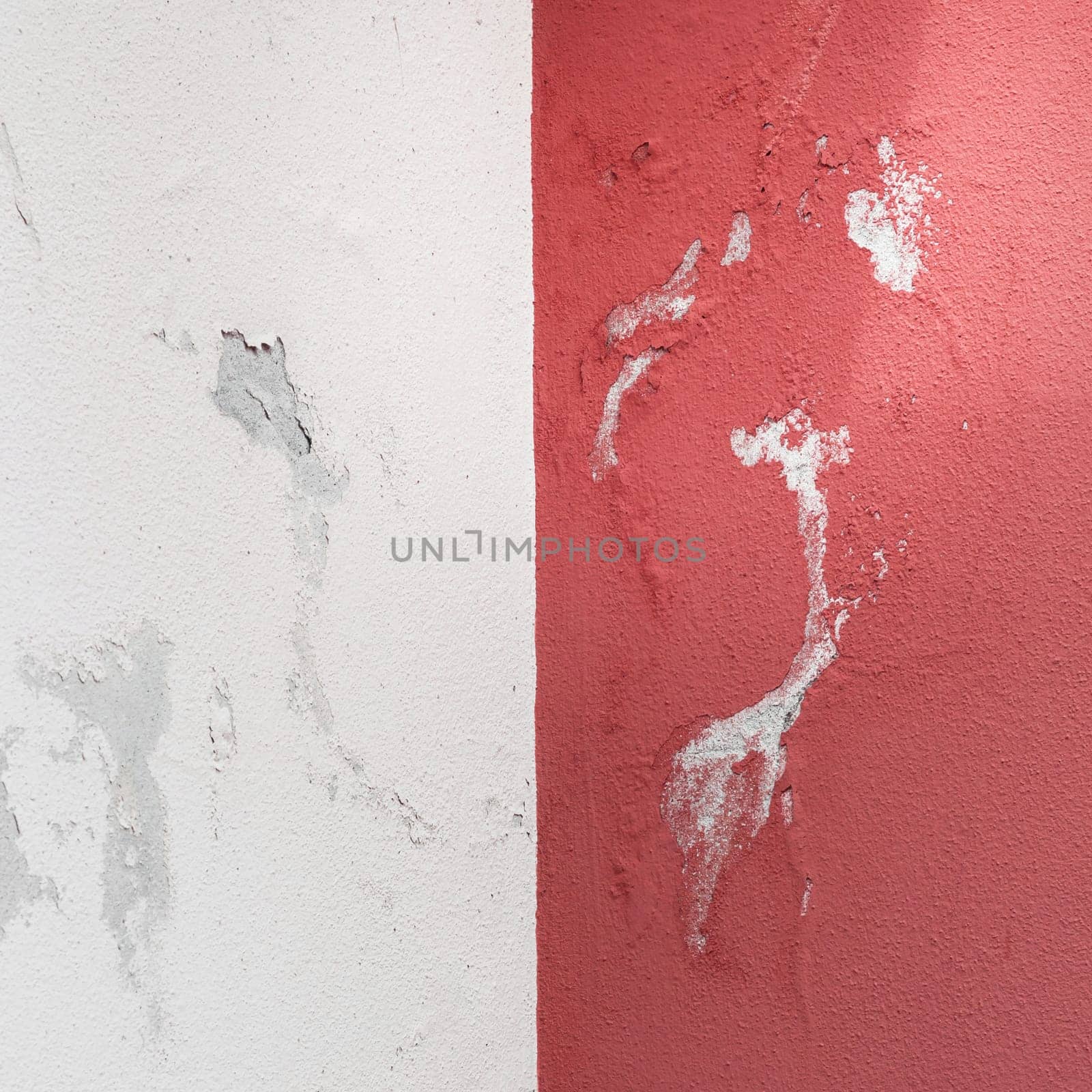 Peeling painted wall, texture, grunge background, cracked paint with red wall.