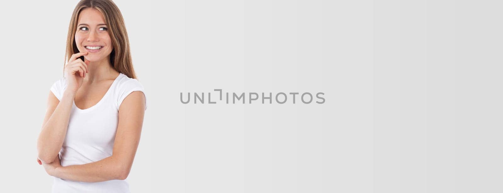 Portrait of a smiling woman looking at something, isolated on white
