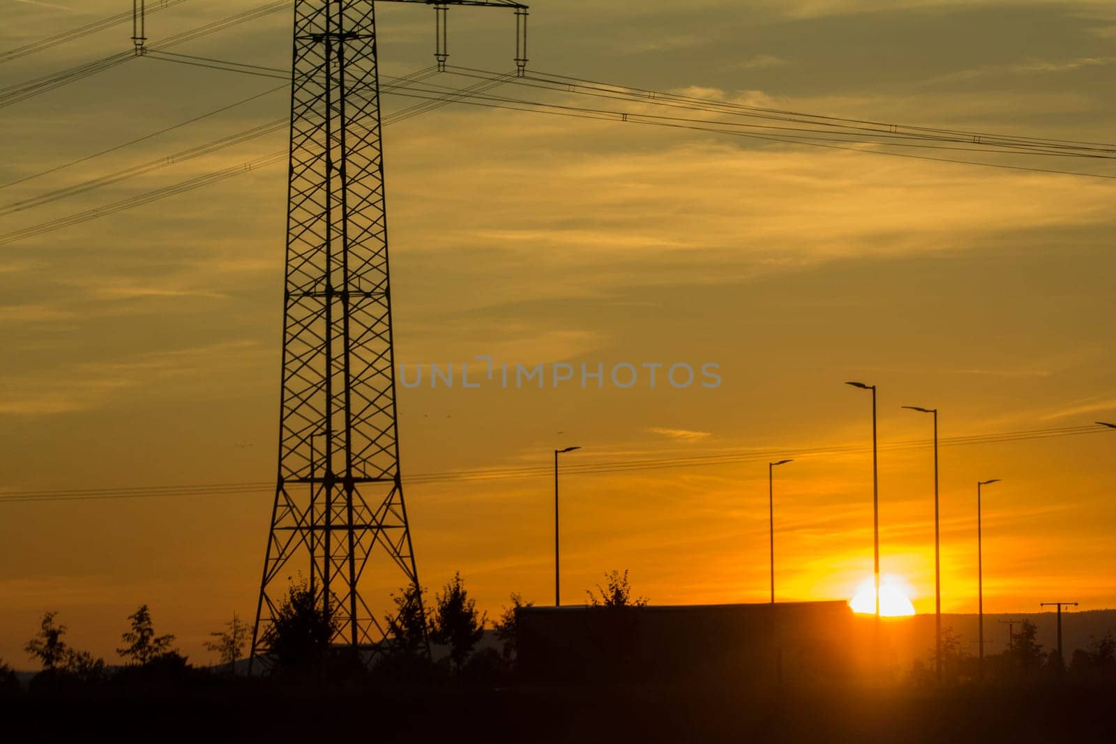 electric grid at sunset