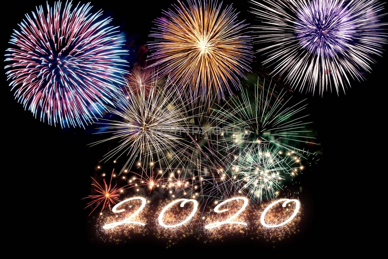 Aparkling number 2020 with fireworks on dark background. Hew Year.