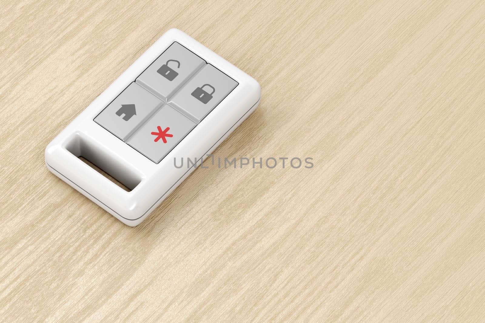 Remote control for home alarm or car on wood table