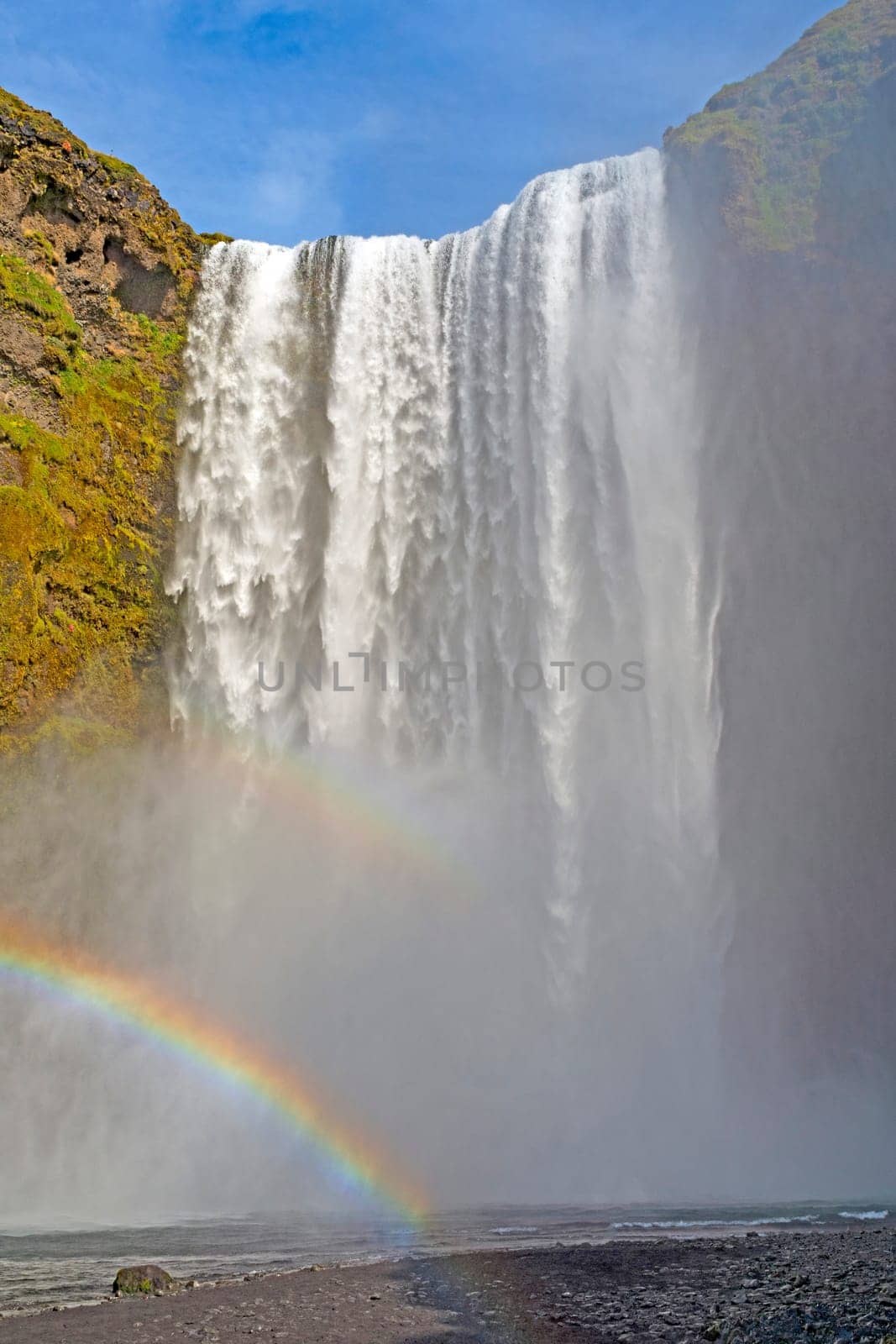 Colorful Skogafoss Falls Above a Rainbow in Iceland