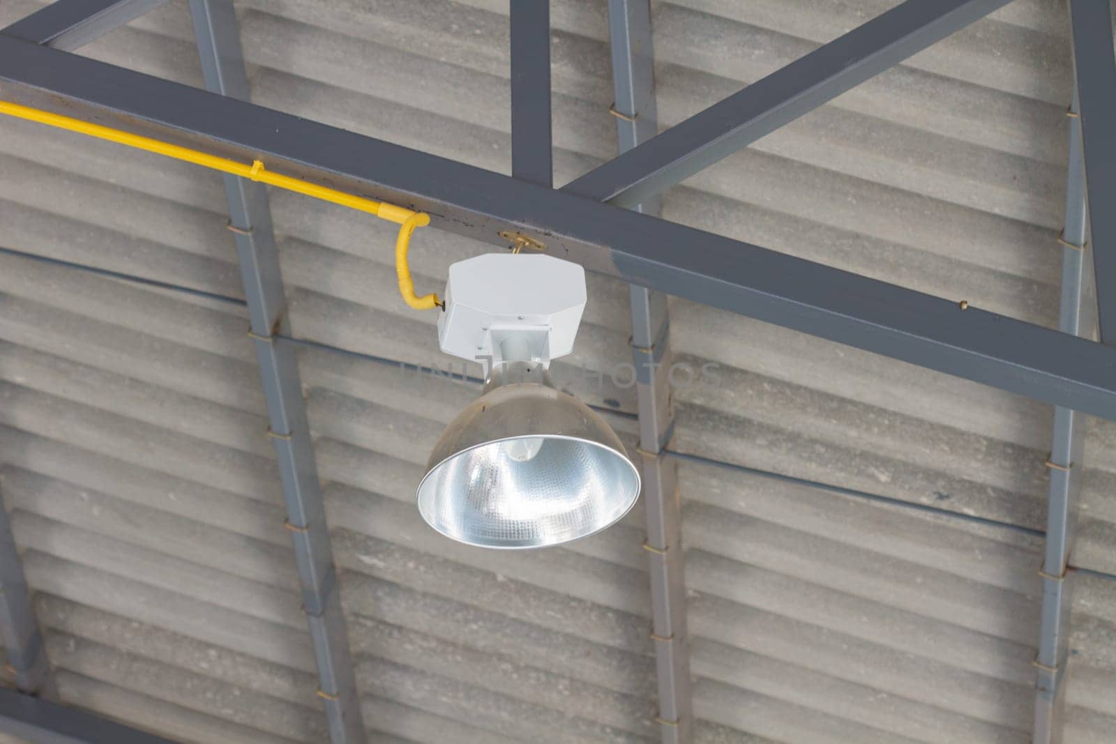 fluorescent lamp on the modern ceiling of factory