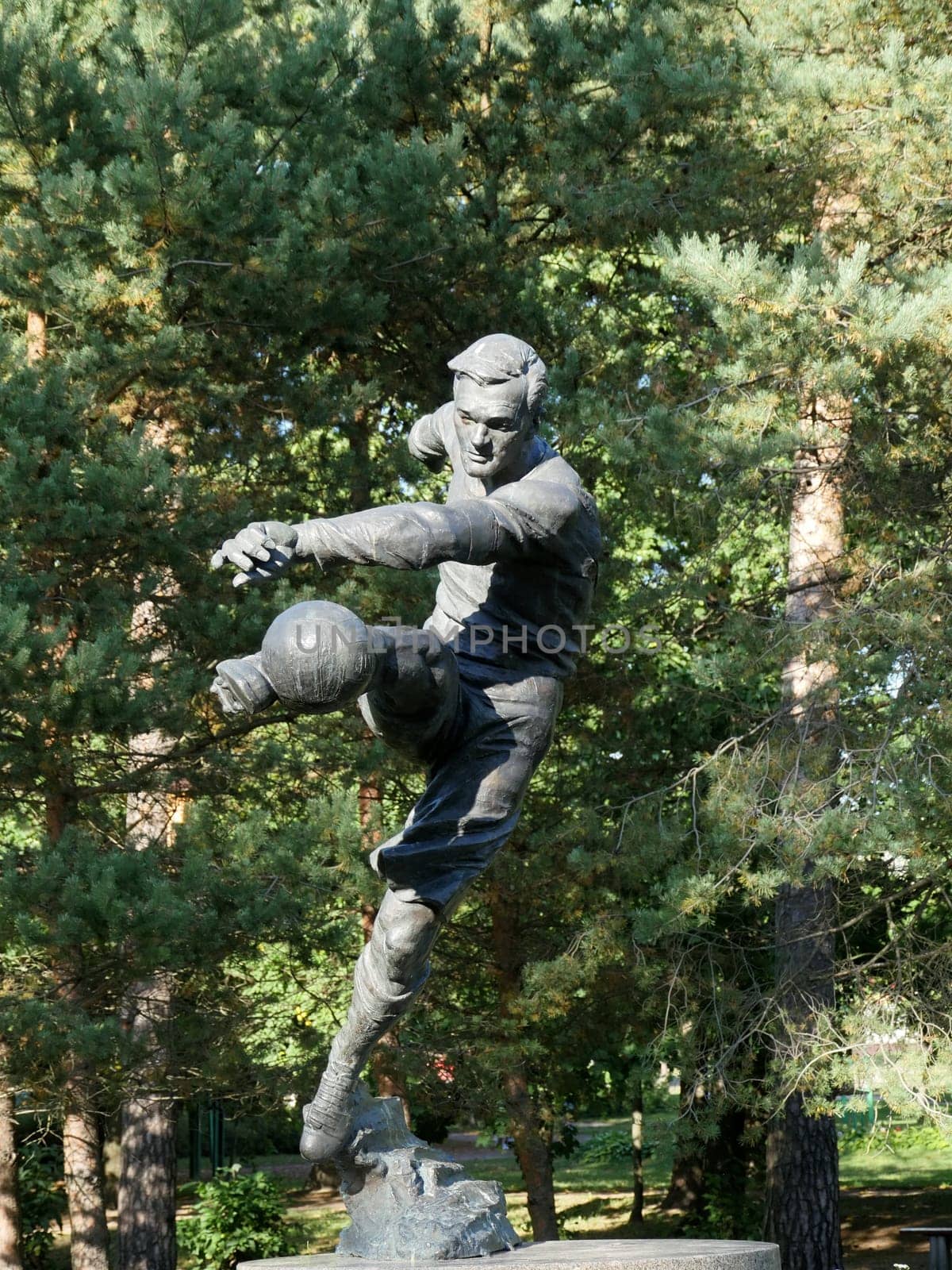 St. Petersburg, Russia, August 27, 2019 Monument to the football player Vsevolod Bobrov, soccer player kick  ball in motion