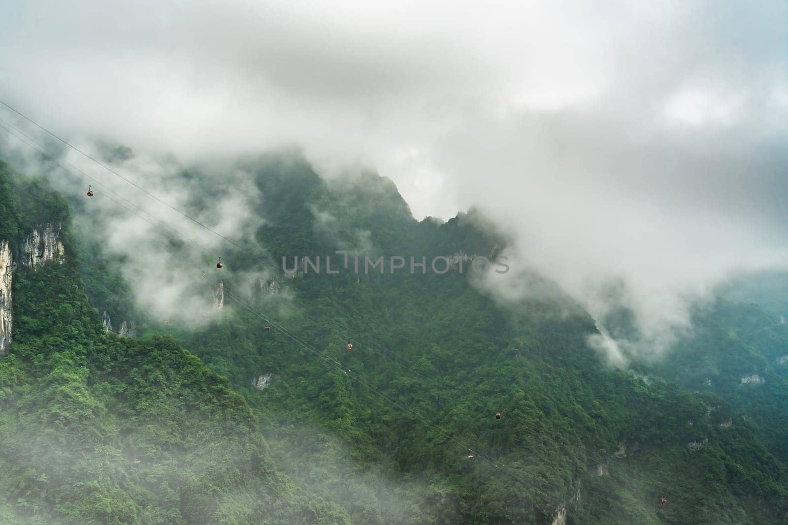 Asia longest cable car going to the top of the famous Heaven Linking Avenue or Big Gate Road Tianmen mountains, Zhangjiajie, China