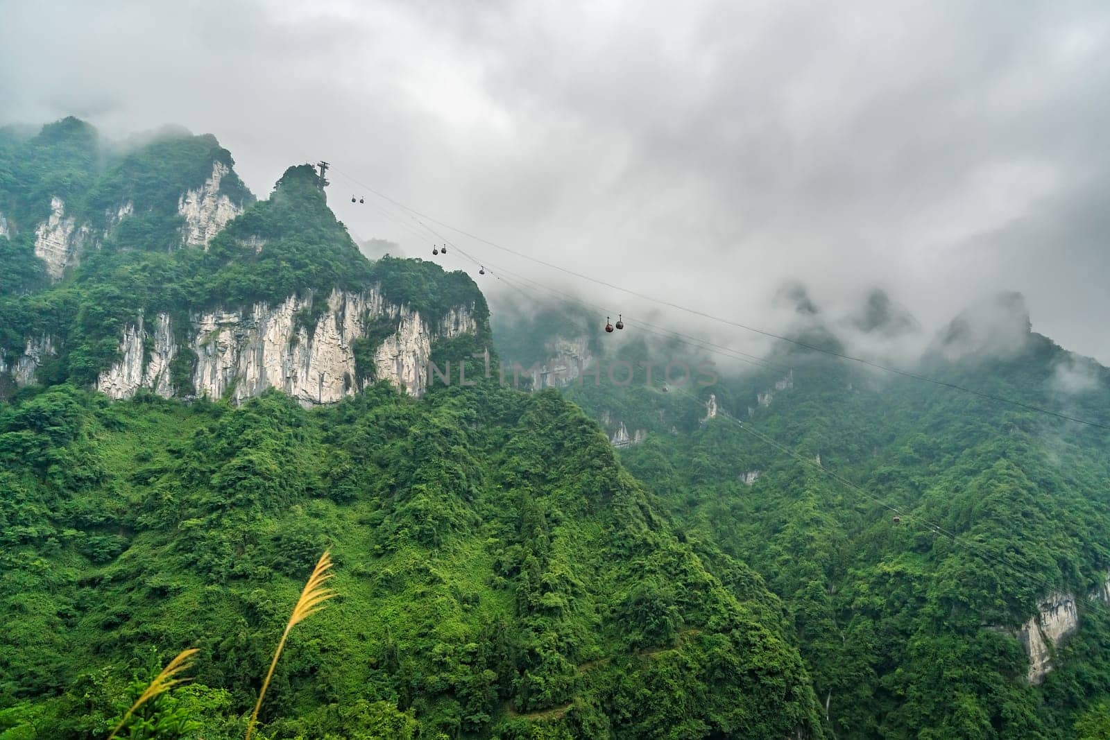 Asia longest cable car going to the top of the famous Heaven Linking Avenue or Big Gate Road Tianmen mountains, Zhangjiajie, China