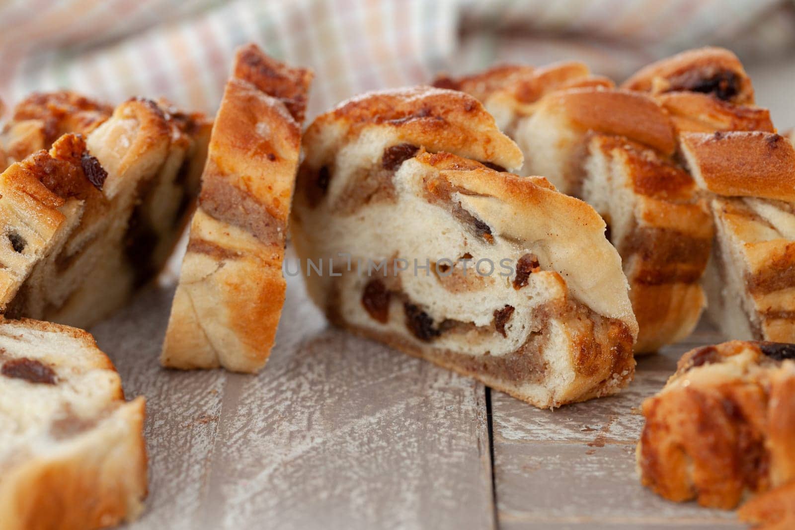 Homemade braided cake with a nuts and almonds filling