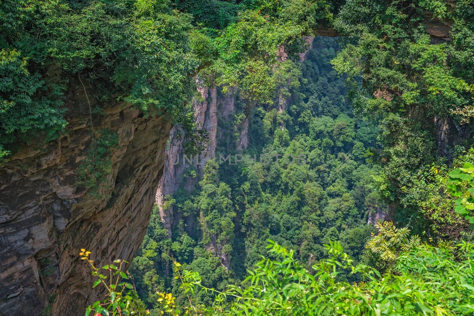 View from the scenic platform over the Tian Qiao or the Greatest Natural Bridge in Yuanjiajie scenic area, Zhangjiajie Forest Park, Hunan province, China