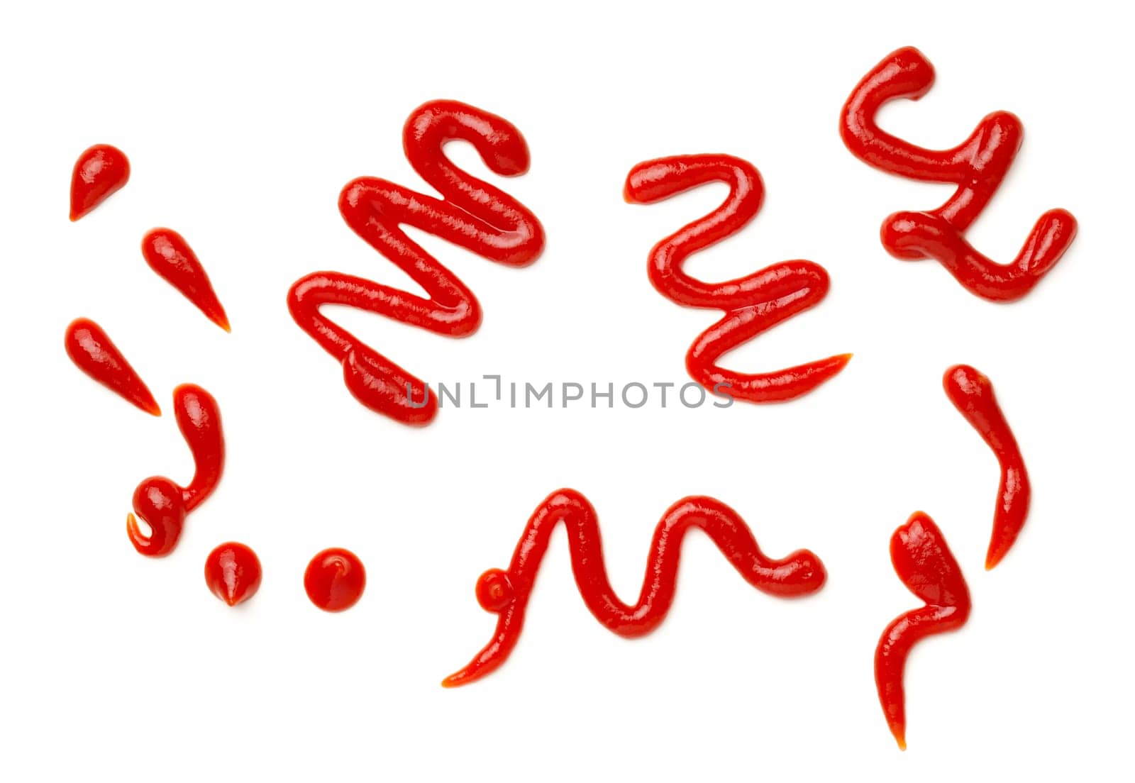 Ketchup splashes isolated on white background. Tomato sauce. Top view, flat lay