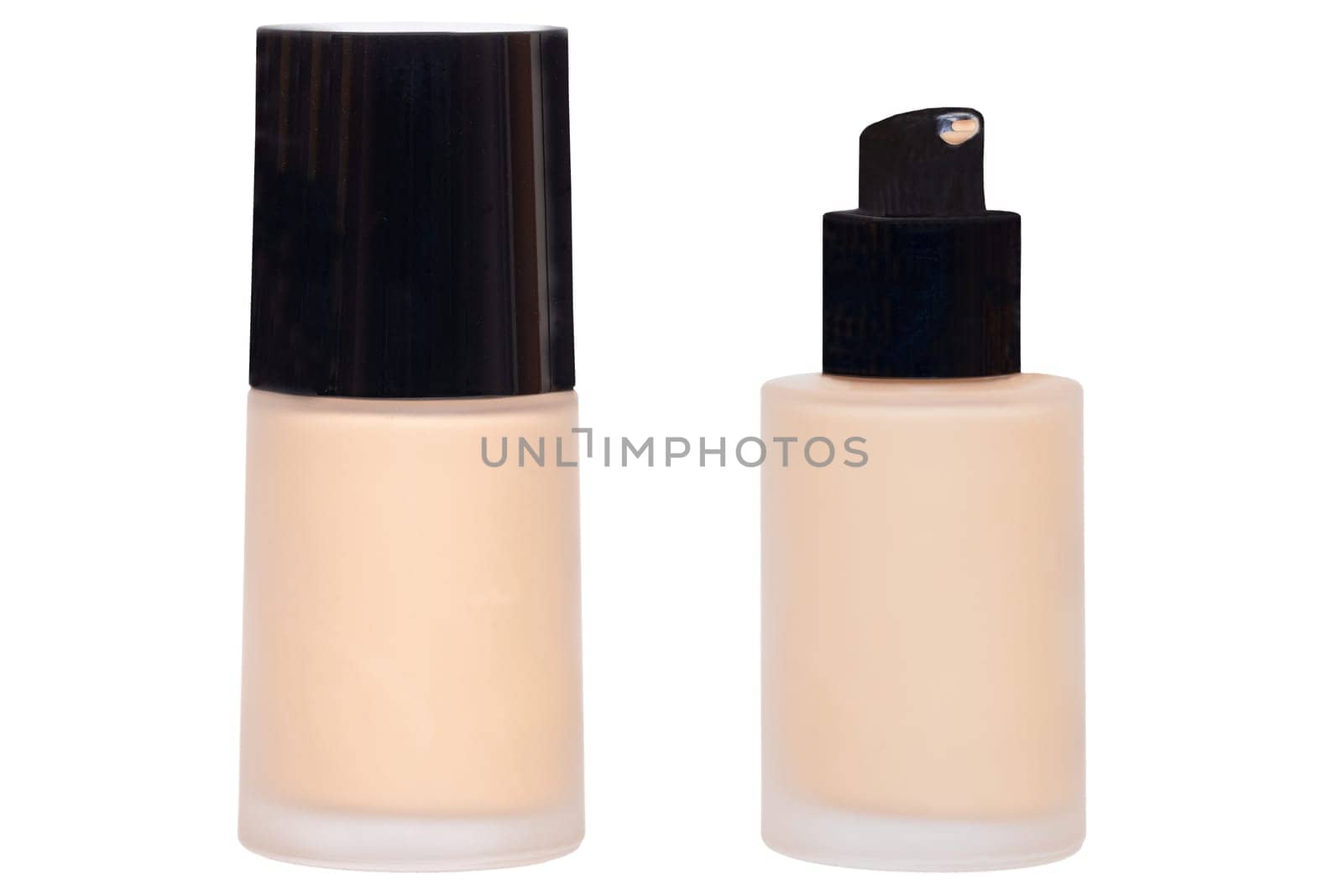 Cosmetic foundation isolated. Close-up of an closed and open glass bottle with liquid skin foundation isolated on a white background. Makeup concept of moisturiser and toner creme. Macro.