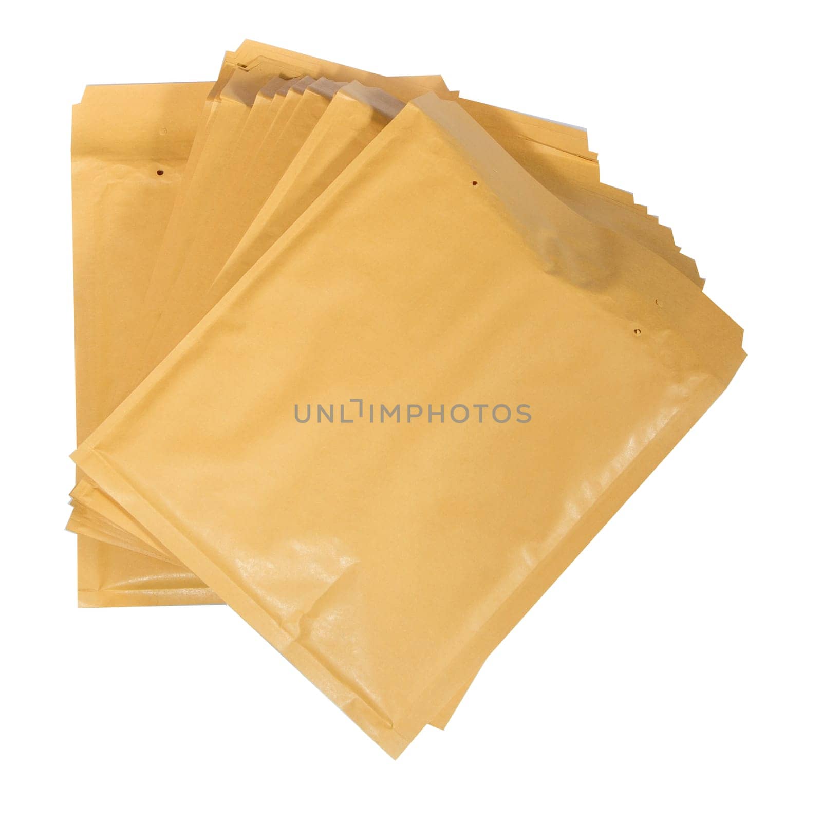 Stack of padded mailing envelopes isolated against a white background