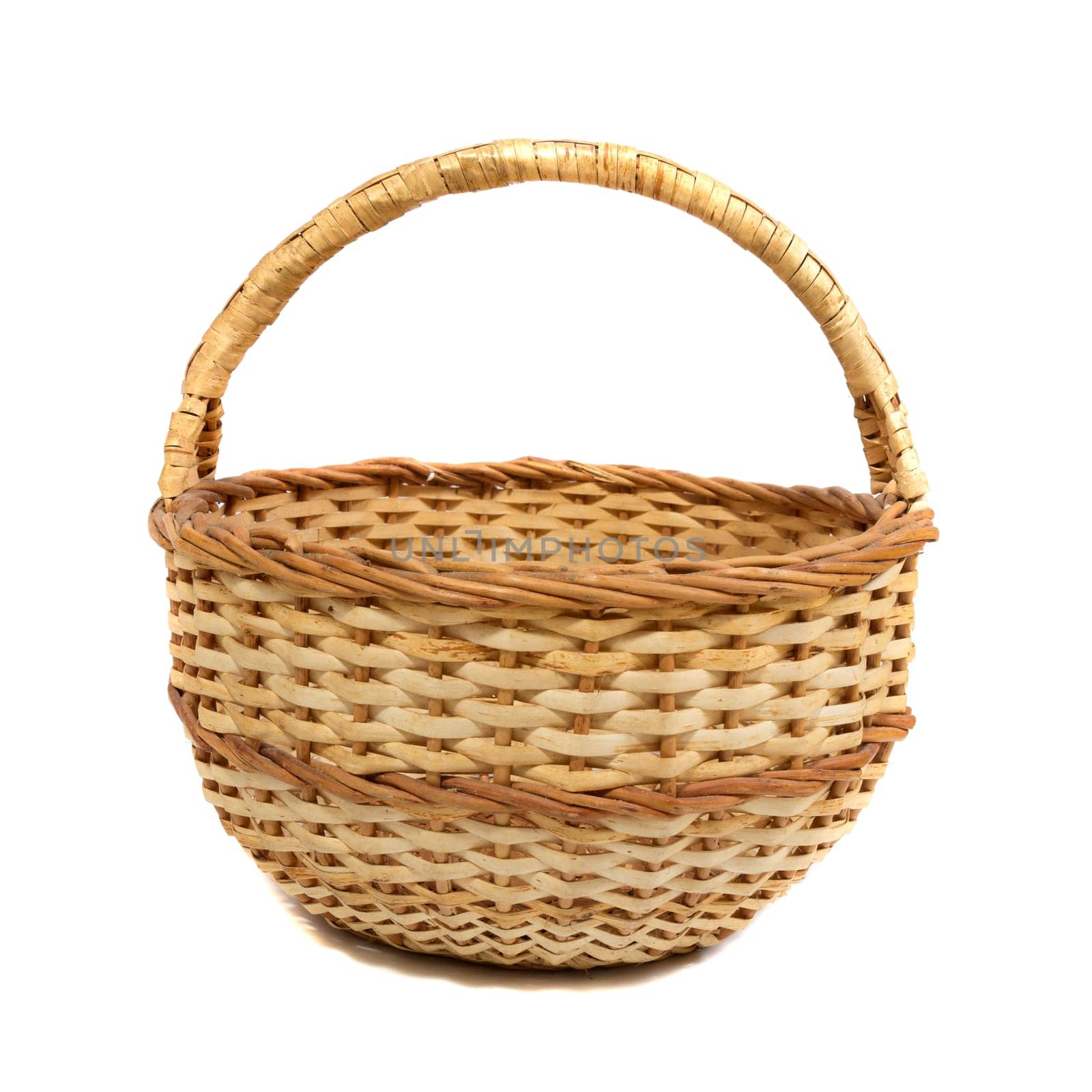 Empty wooden wicker basket isolated on white background.