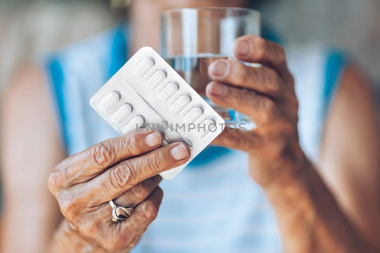Senior woman taking her daily prescripted medication