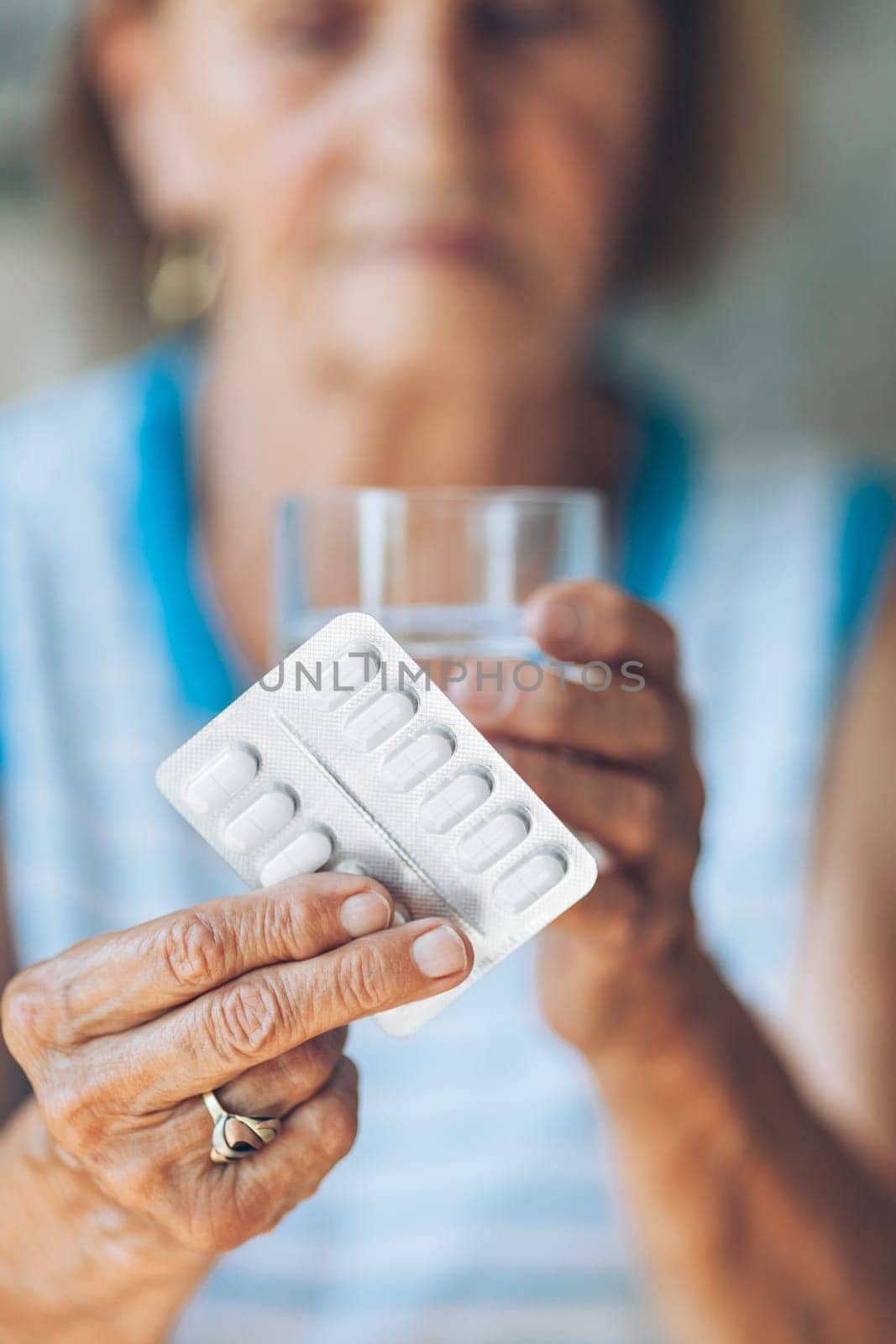 Senior woman taking her daily prescripted medication
