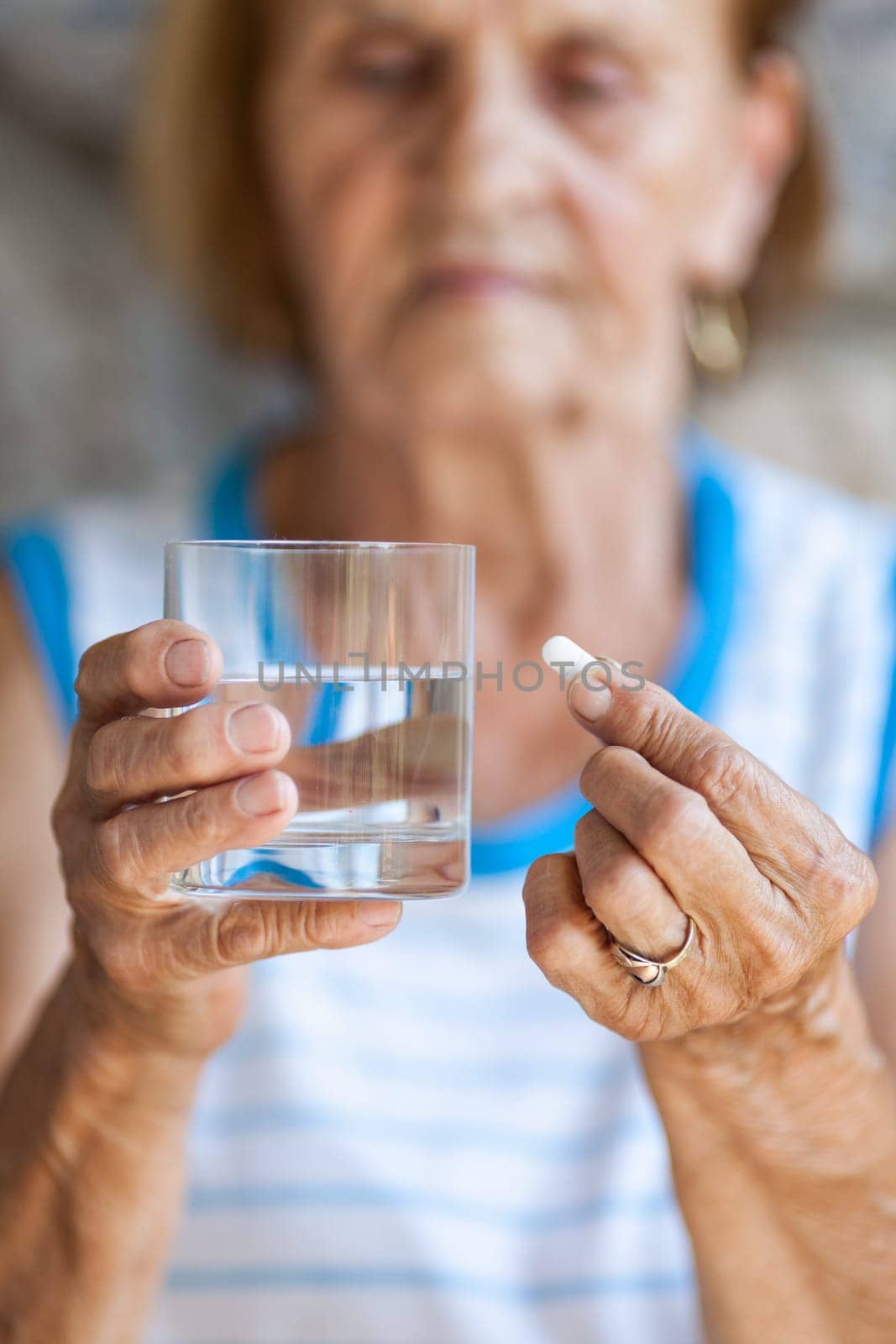 Senior woman taking her daily prescripted medication