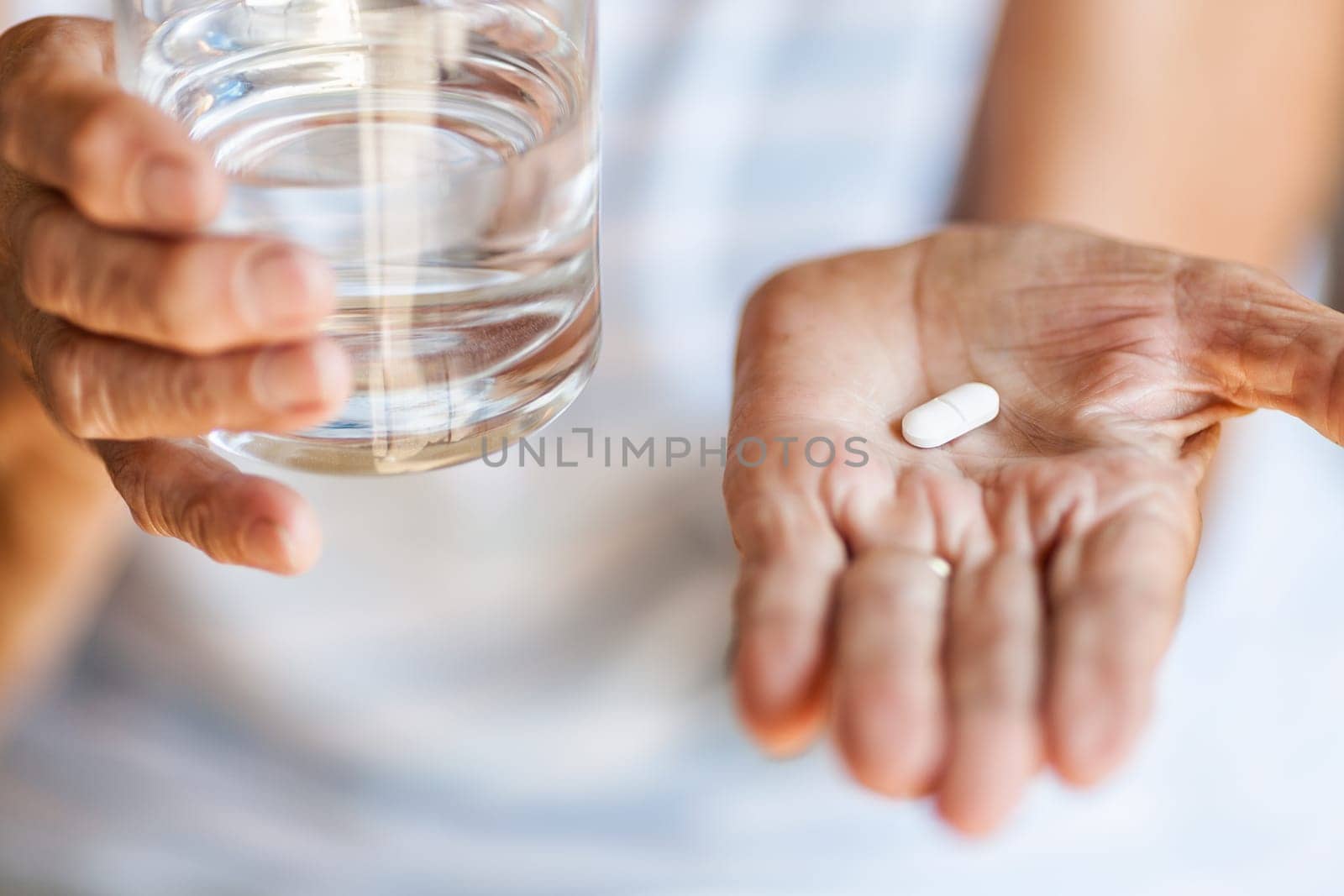 Senior woman taking her daily prescripted medication
