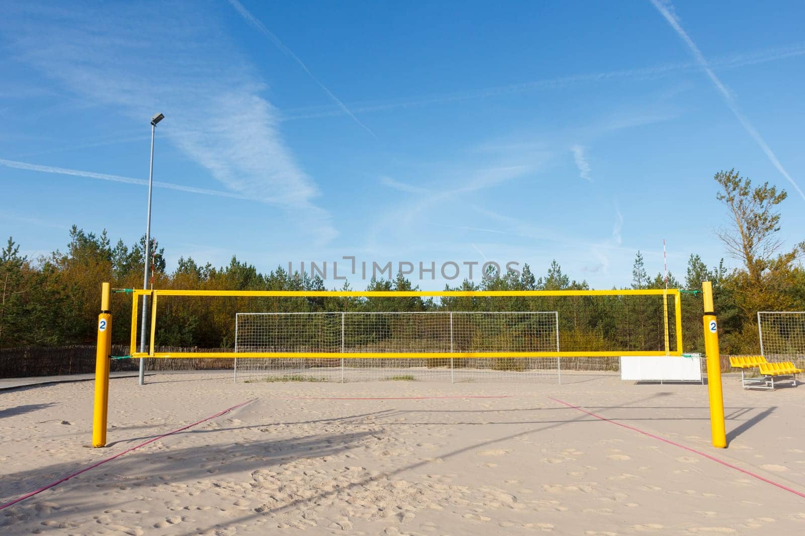 equipped beach volleyball court with spectator seats