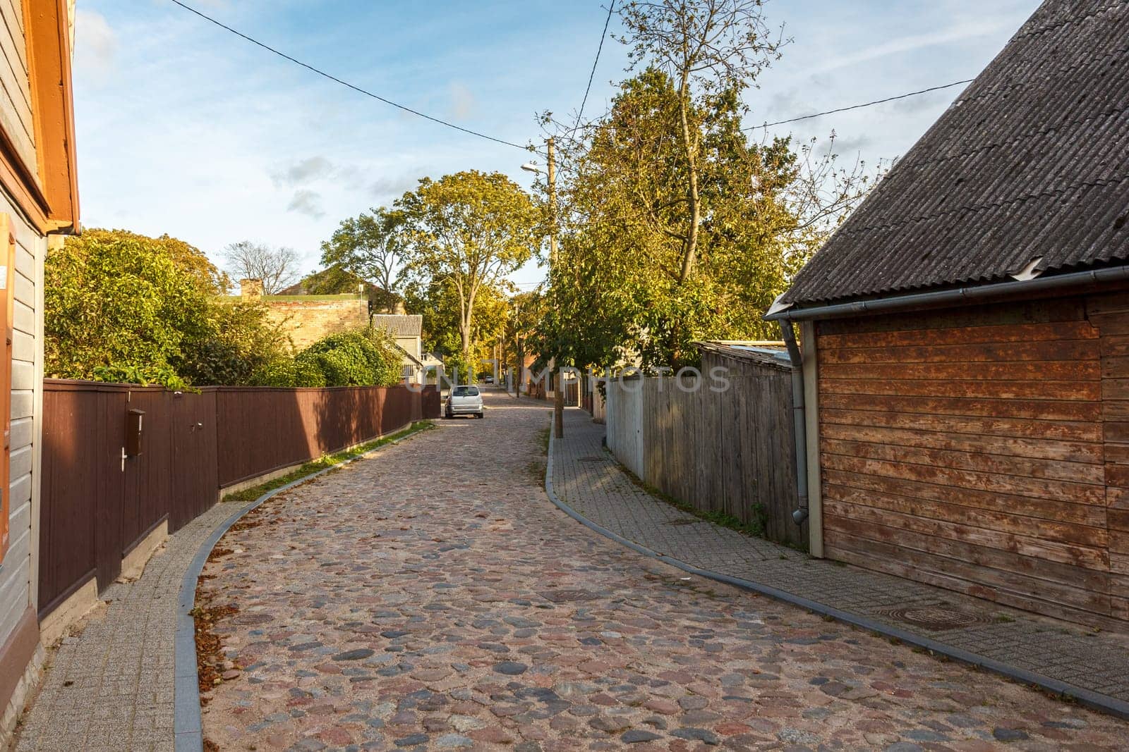 Latvia, Ventspils, Ostgals. Ostgals is a quiet part of the city that formed as a result of the Russian government in 1836 offering to the local peasants privileges for settling in the city s dune area. Ostgals is listed as a national monument of urban architecture.