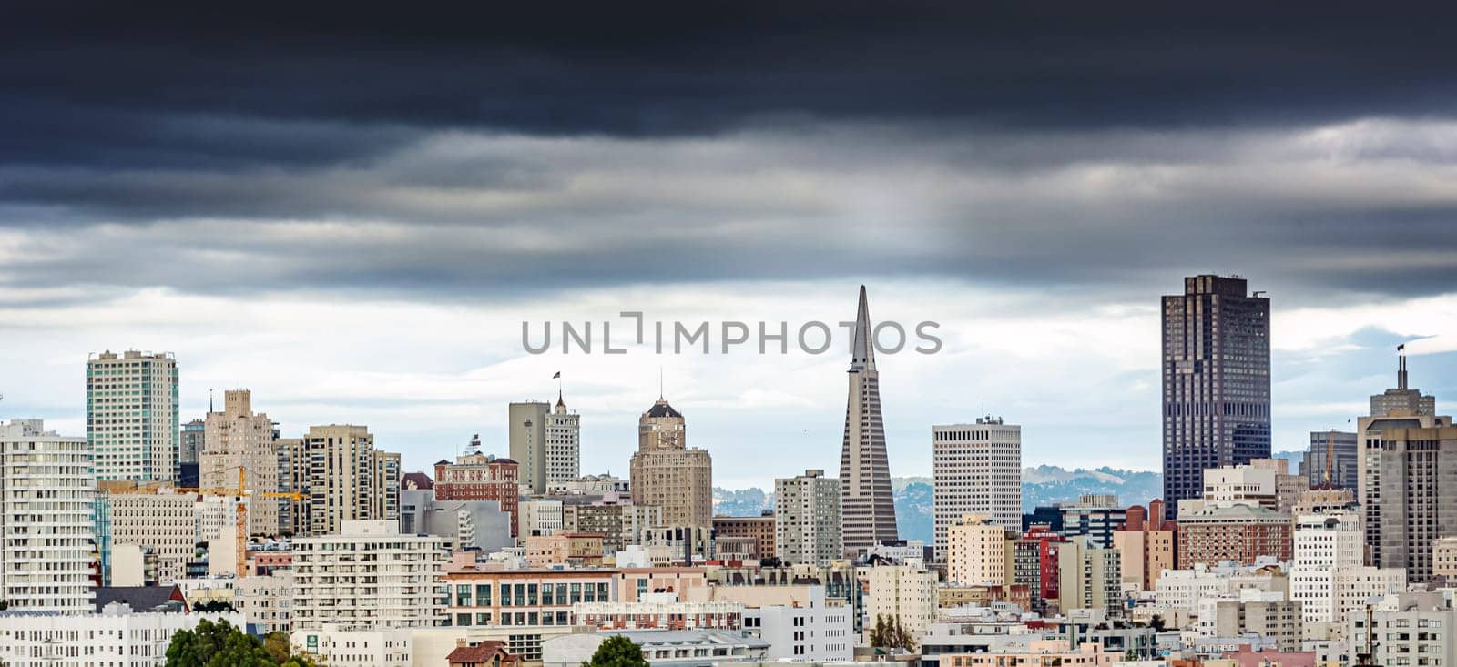 San Francisco city skyline on a cloudy day. Bad weather and heavy clouds